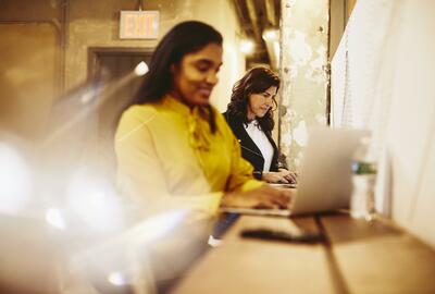 Women working on their laptops Women working on their laptops